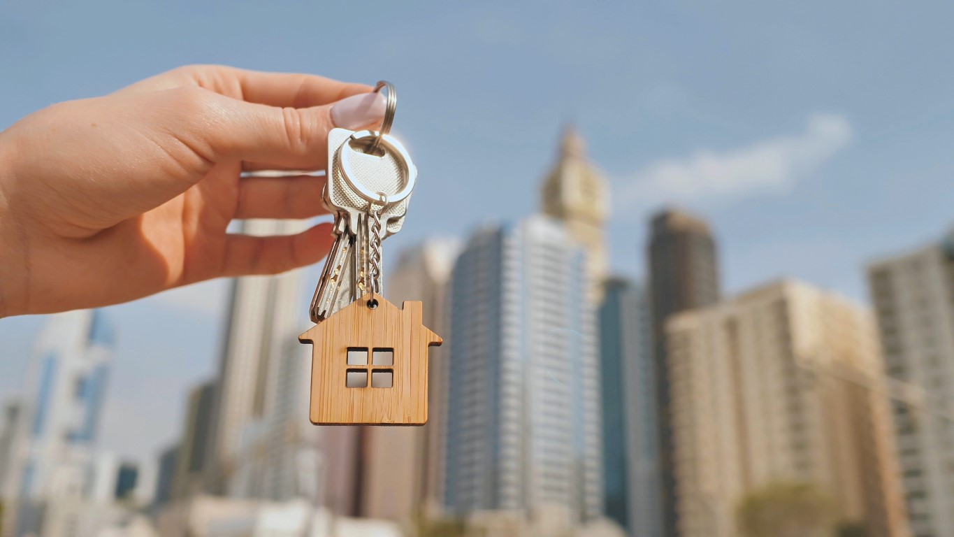 Real,Estate,Purchase,Concept.,The,Girl,Holds,The,Keys,To